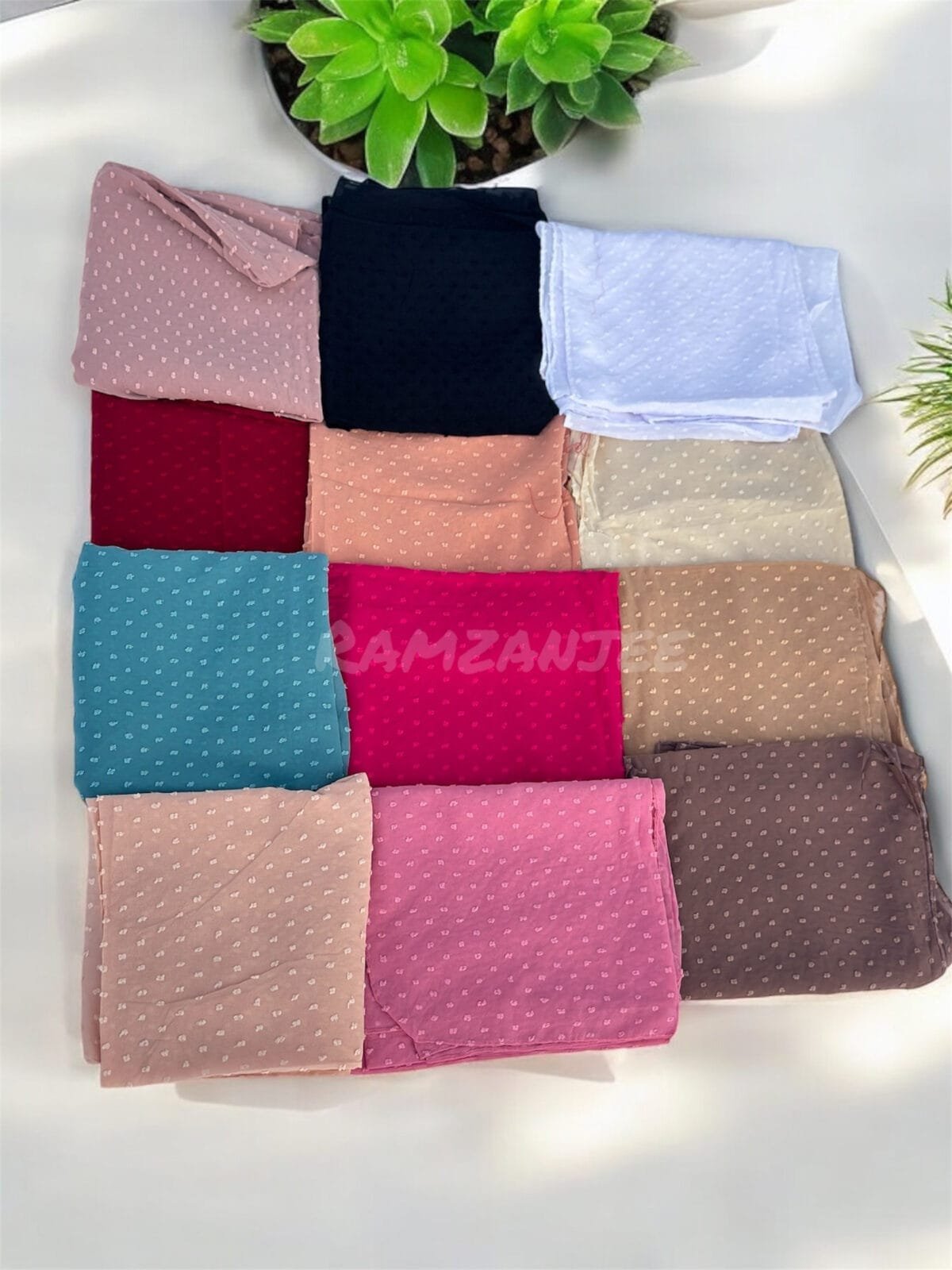 Here are some suggestions tailored to your Metallic Chiffon Hijabs: "Elegant Metallic Chiffon Hijab in shimmering silver, lightweight and breathable." "Close-up of soft, non-slip Metallic Chiffon Hijab draped elegantly." "Model wearing a Metallic Chiffon Hijab in rose gold, styled for a formal occasion." "Flat lay of Metallic Chiffon Hijabs in multiple colors, perfect for modest fashion." "Shimmering Metallic Chiffon Hijab folded neatly, showcasing its luxurious fabric."
