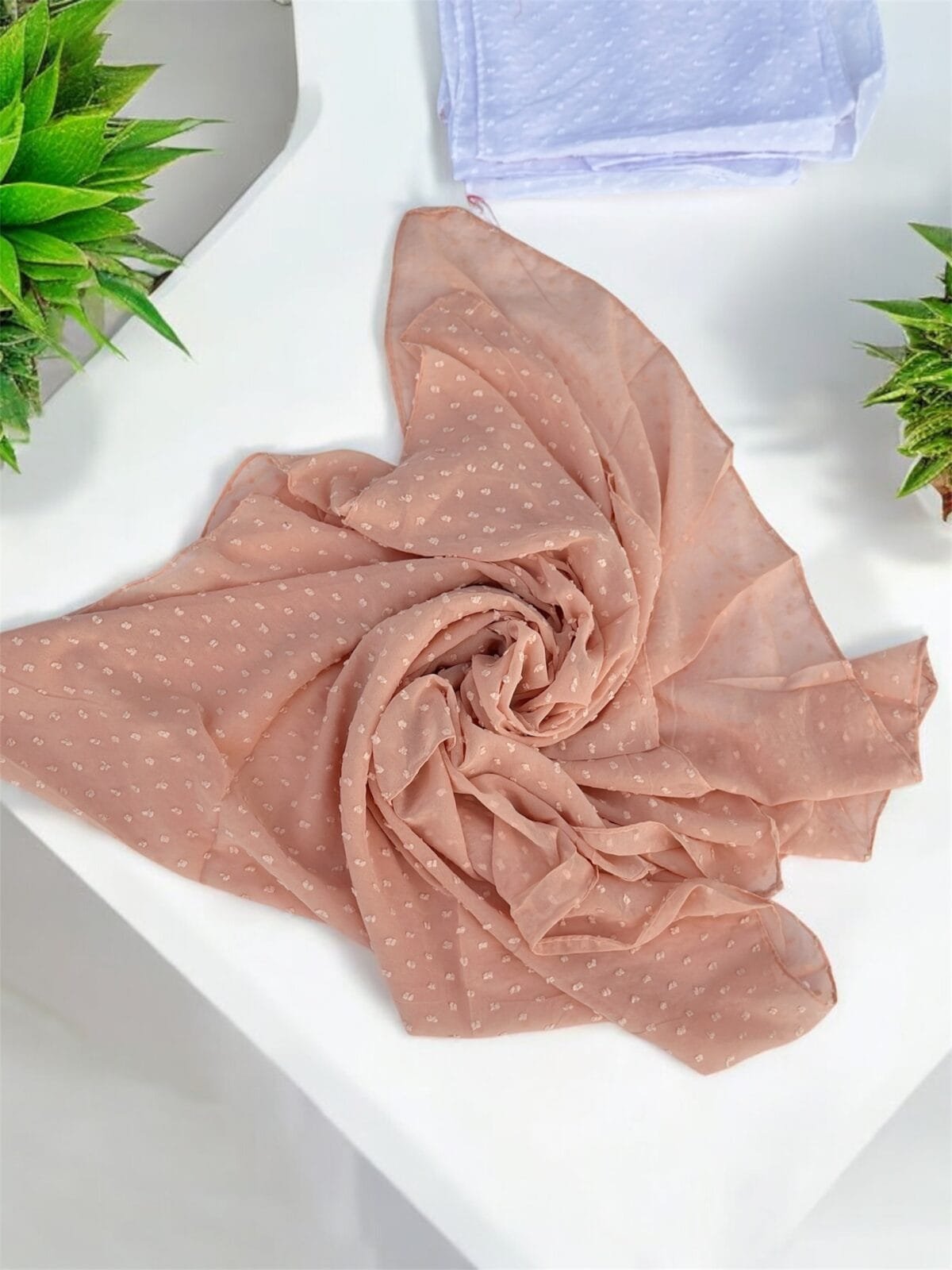 Here are some suggestions tailored to your Metallic Chiffon Hijabs: "Elegant Metallic Chiffon Hijab in shimmering silver, lightweight and breathable." "Close-up of soft, non-slip Metallic Chiffon Hijab draped elegantly." "Model wearing a Metallic Chiffon Hijab in rose gold, styled for a formal occasion." "Flat lay of Metallic Chiffon Hijabs in multiple colors, perfect for modest fashion." "Shimmering Metallic Chiffon Hijab folded neatly, showcasing its luxurious fabric."