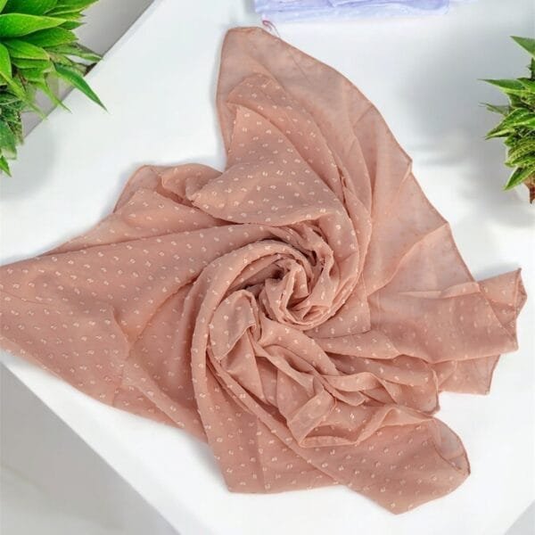 Here are some suggestions tailored to your Metallic Chiffon Hijabs: "Elegant Metallic Chiffon Hijab in shimmering silver, lightweight and breathable." "Close-up of soft, non-slip Metallic Chiffon Hijab draped elegantly." "Model wearing a Metallic Chiffon Hijab in rose gold, styled for a formal occasion." "Flat lay of Metallic Chiffon Hijabs in multiple colors, perfect for modest fashion." "Shimmering Metallic Chiffon Hijab folded neatly, showcasing its luxurious fabric."