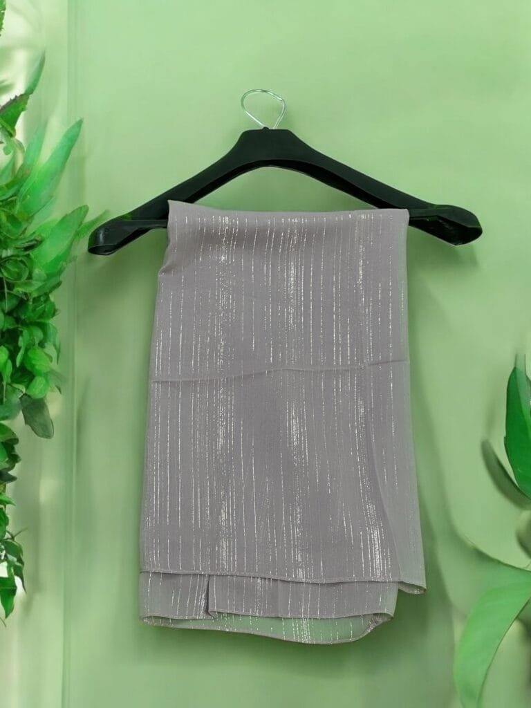 Here are some suggestions tailored to your Metallic Chiffon Hijabs: "Elegant Metallic Chiffon Hijab in shimmering silver, lightweight and breathable." "Close-up of soft, non-slip Metallic Chiffon Hijab draped elegantly." "Model wearing a Metallic Chiffon Hijab in rose gold, styled for a formal occasion." "Flat lay of Metallic Chiffon Hijabs in multiple colors, perfect for modest fashion." "Shimmering Metallic Chiffon Hijab folded neatly, showcasing its luxurious fabric."
