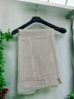 Here are some suggestions tailored to your Metallic Chiffon Hijabs: "Elegant Metallic Chiffon Hijab in shimmering silver, lightweight and breathable." "Close-up of soft, non-slip Metallic Chiffon Hijab draped elegantly." "Model wearing a Metallic Chiffon Hijab in rose gold, styled for a formal occasion." "Flat lay of Metallic Chiffon Hijabs in multiple colors, perfect for modest fashion." "Shimmering Metallic Chiffon Hijab folded neatly, showcasing its luxurious fabric."