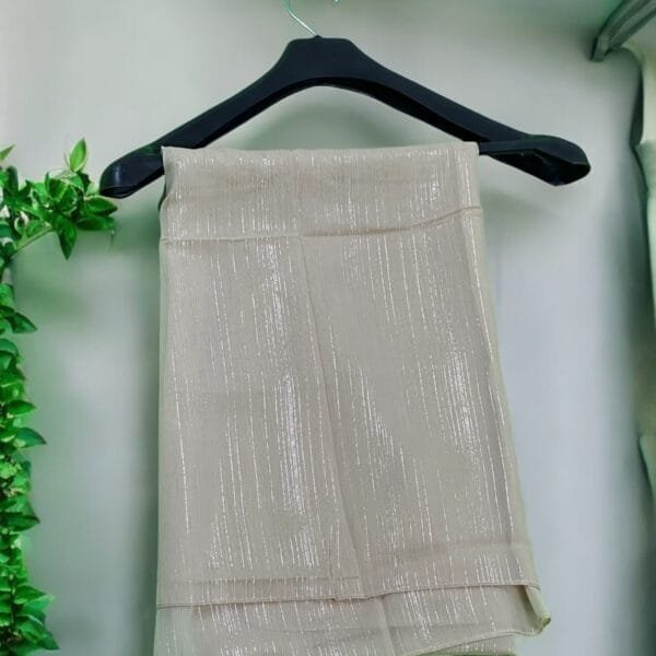 Here are some suggestions tailored to your Metallic Chiffon Hijabs: "Elegant Metallic Chiffon Hijab in shimmering silver, lightweight and breathable." "Close-up of soft, non-slip Metallic Chiffon Hijab draped elegantly." "Model wearing a Metallic Chiffon Hijab in rose gold, styled for a formal occasion." "Flat lay of Metallic Chiffon Hijabs in multiple colors, perfect for modest fashion." "Shimmering Metallic Chiffon Hijab folded neatly, showcasing its luxurious fabric."