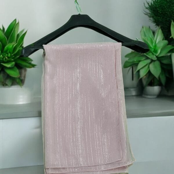 Here are some suggestions tailored to your Metallic Chiffon Hijabs: "Elegant Metallic Chiffon Hijab in shimmering silver, lightweight and breathable." "Close-up of soft, non-slip Metallic Chiffon Hijab draped elegantly." "Model wearing a Metallic Chiffon Hijab in rose gold, styled for a formal occasion." "Flat lay of Metallic Chiffon Hijabs in multiple colors, perfect for modest fashion." "Shimmering Metallic Chiffon Hijab folded neatly, showcasing its luxurious fabric."