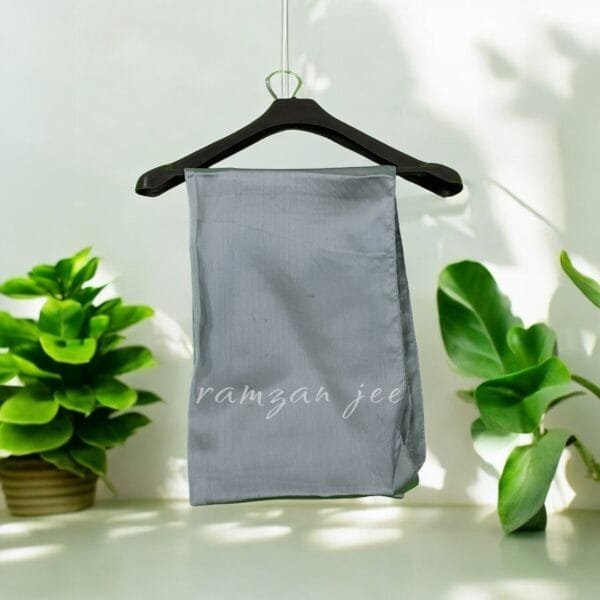 Elegant long hijab in soft chiffon fabric, perfect for modest fashion." "Lightweight and breathable hijab in classic black for full coverage."