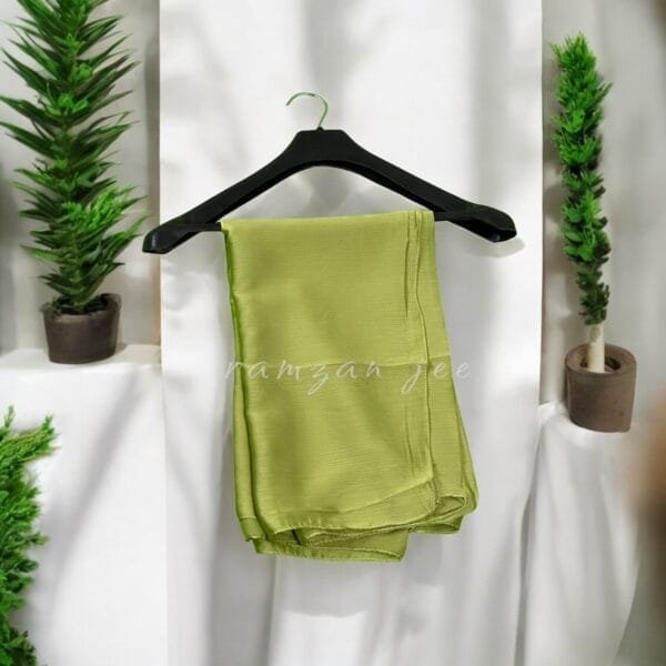 "Elegant long hijab in soft chiffon fabric, perfect for modest fashion."