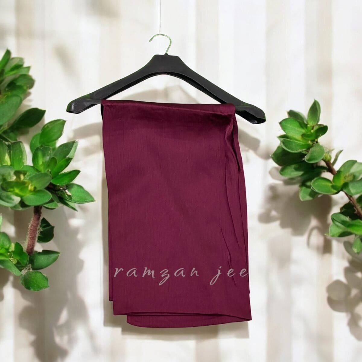 "Elegant long hijab in soft chiffon fabric, perfect for modest fashion." "Lightweight and breathable hijab in classic black for full coverage."