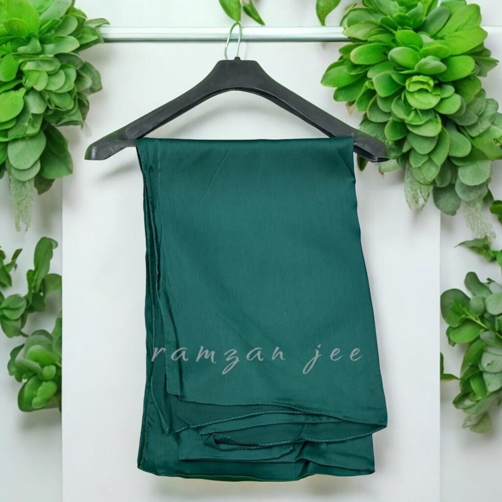 "Elegant long hijab in soft chiffon fabric, perfect for modest fashion." "Lightweight and breathable hijab in classic black for full coverage."