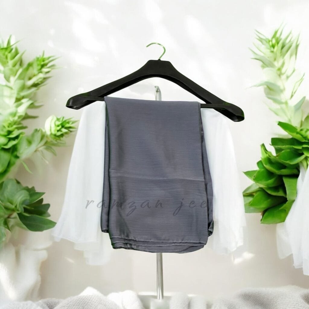 "Elegant silk hijab in soft chiffon fabric, perfect for modest fashion." "Lightweight and breathable silk hijab in classic black for full coverage."