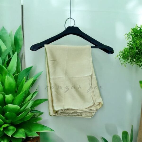Elegant silk hijab in soft chiffon fabric, perfect for modest fashion." "Lightweight and breathable silk hijab in classic black for full coverage."