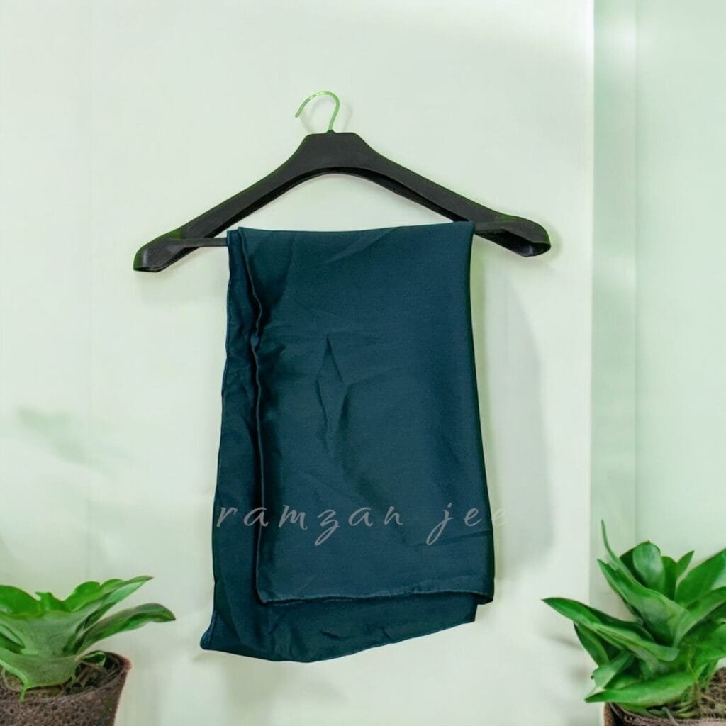 "Elegant silk hijab in soft chiffon fabric, perfect for modest fashion." "Lightweight and breathable silk hijab in classic black for full coverage."