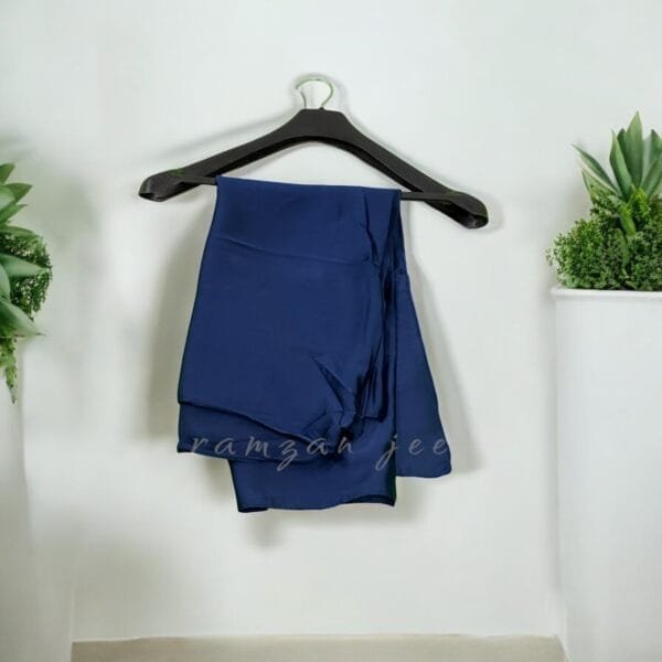 "Versatile silk hijab styled for casual and formal occasions."
