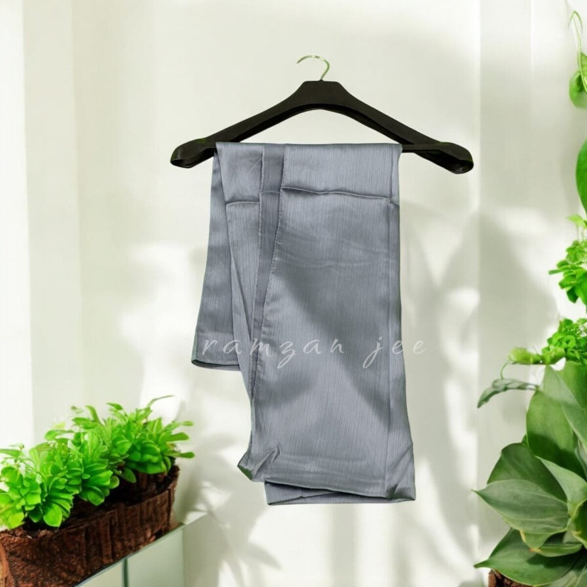 "Elegant silk hijab in soft chiffon fabric, perfect for modest fashion."