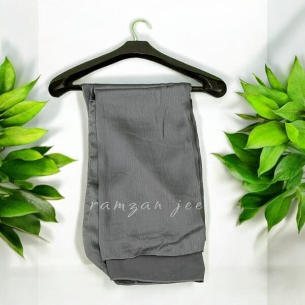 Lightweight and breathable silk hijab in classic black for full coverage.