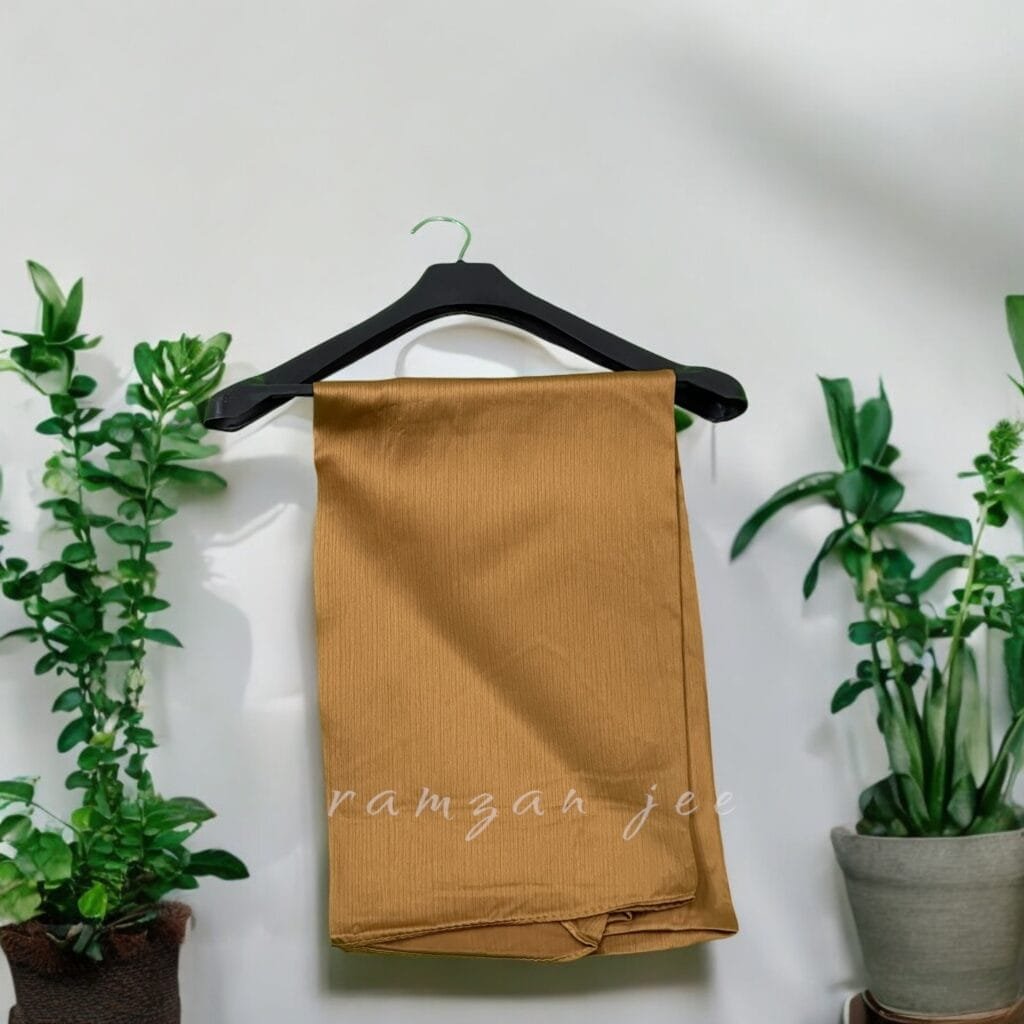 "Versatile silk hijab styled for casual and formal occasions."