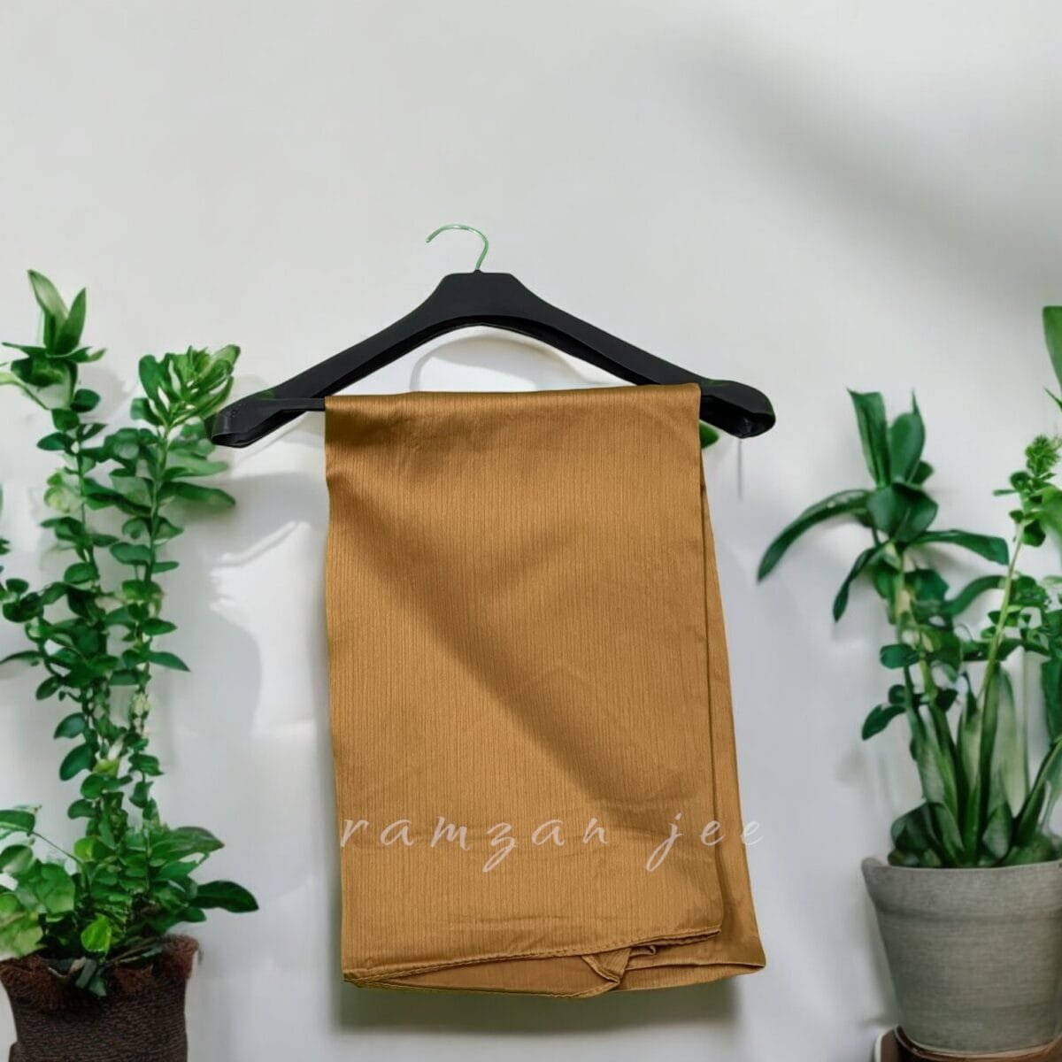 "Versatile silk hijab styled for casual and formal occasions."