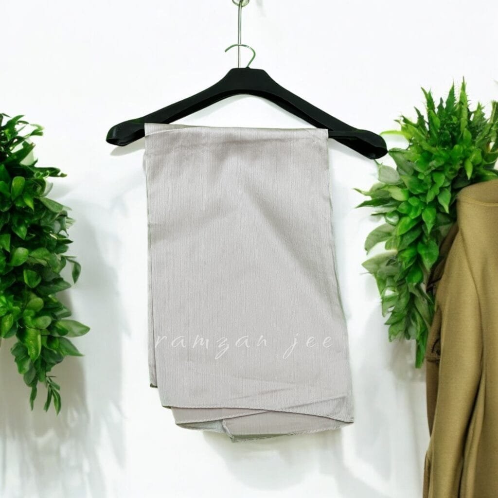 "Elegant silk hijab in soft chiffon fabric, perfect for modest fashion."