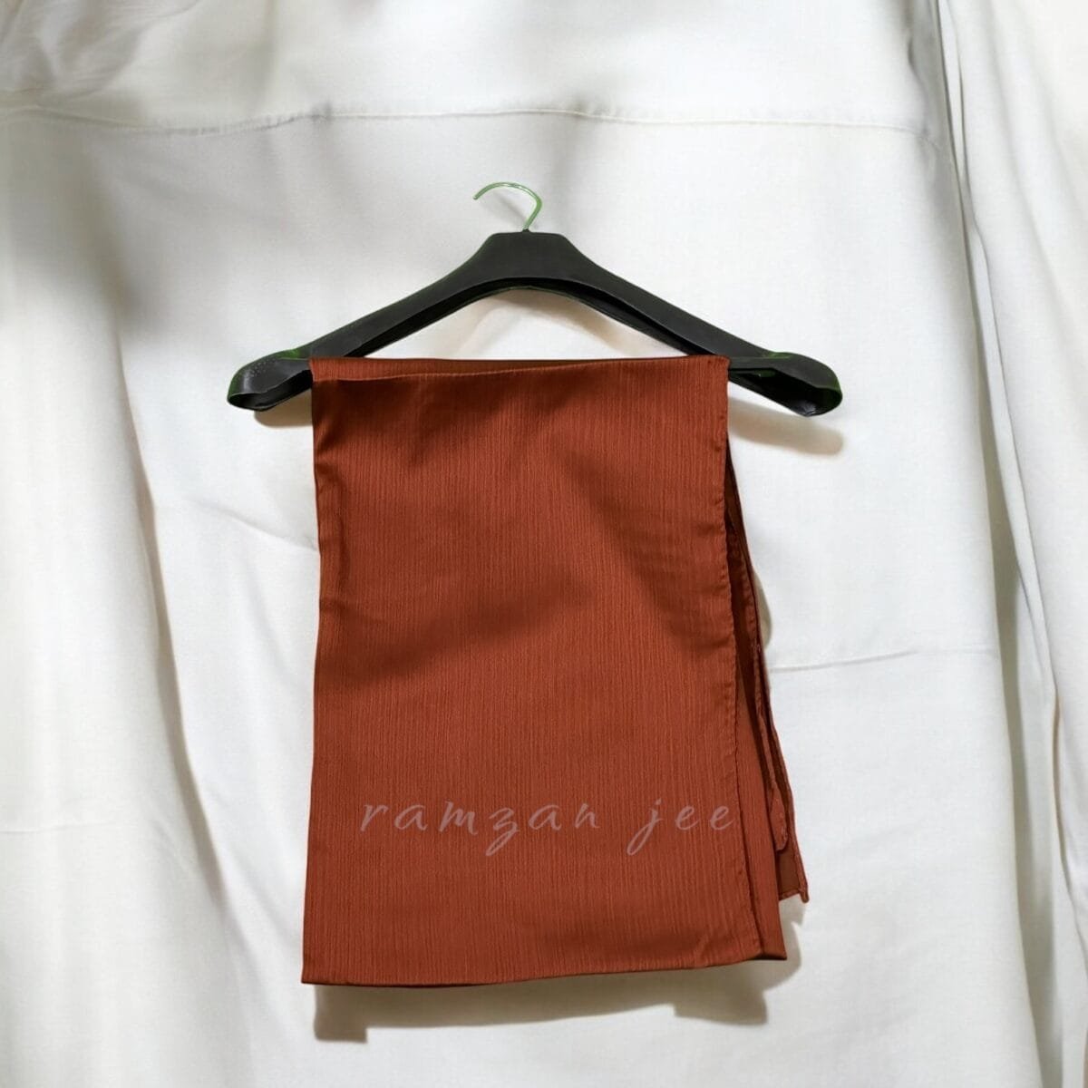 Elevate your wardrobe with our luxurious long hijabs, designed for modern women who value both modesty and elegance. Made from premium, breathable fabrics, these hijabs are perfect for everyday wear, special occasions, or professional settings. Our hijabs are thoughtfully crafted to provide full coverage while ensuring maximum comfort throughout the day. With a variety of rich colors, classic designs, and contemporary styles, these hijabs are a must-have for every woman seeking modest fashion with a touch of sophistication. Features and Benefits: High-Quality Material: Crafted from lightweight, soft, and durable fabrics such as chiffon, jersey, and silk. These materials ensure a wrinkle-free, breathable, and non-slip fit all day long. Generous Length and Coverage: Measuring [insert dimensions], our long hijabs offer full coverage, making them ideal for layering, draping, or styling in various ways. Versatile Styling Options: Perfect for casual outings, professional environments, or elegant evening wear. Achieve a polished look whether you choose a simple wrap, layered folds, or an intricate turban style. Vibrant and Neutral Color Options: Available in a curated palette, including classic black hijabs, soft pastel tones, and bold statement colors to suit your style and mood. Easy Maintenance: Machine-washable and designed to maintain their quality, these hijabs are built for effortless care and longevity. Why Choose Our Hijabs? Fashion Meets Functionality: Designed to combine tradition with contemporary trends. Perfect for Every Occasion: From daily wear hijabs to those ideal for formal events like weddings, Eid, or Ramadan gatherings. Inclusive and Modest: Ideal for women of all ages and backgrounds, respecting diverse needs and preferences. Care Instructions: Hand wash or machine wash on a delicate cycle. Hang to dry to maintain the fabric’s texture and softness. Iron on low heat if needed.