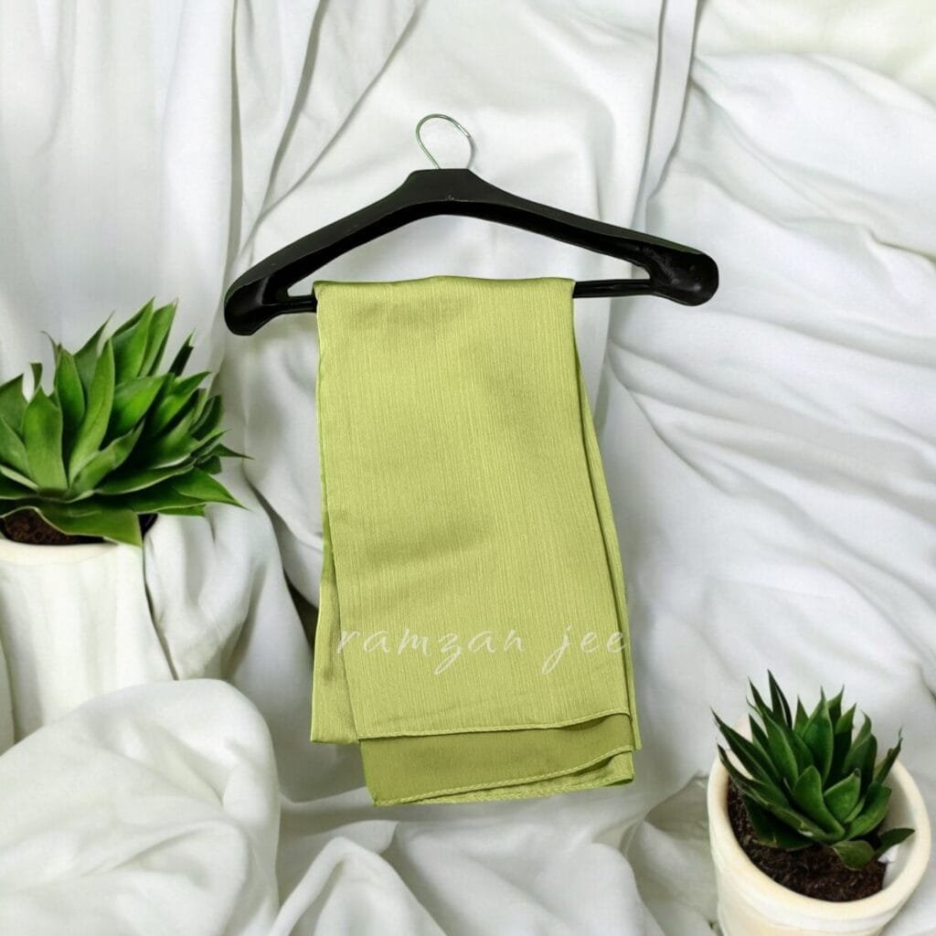 "Lightweight and breathable silk hijab in classic black for full coverage."