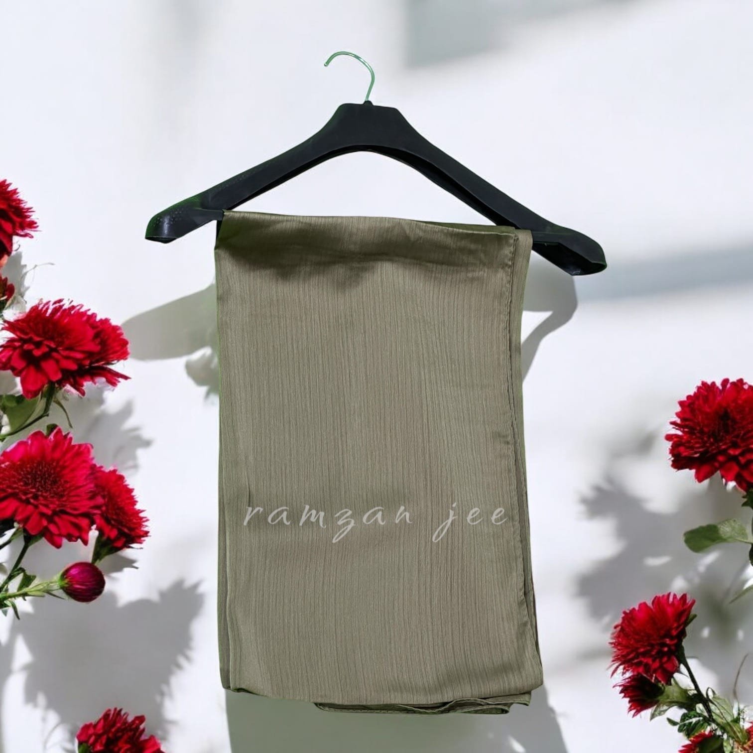 "Elegant silk hijab in soft chiffon fabric, perfect for modest fashion."