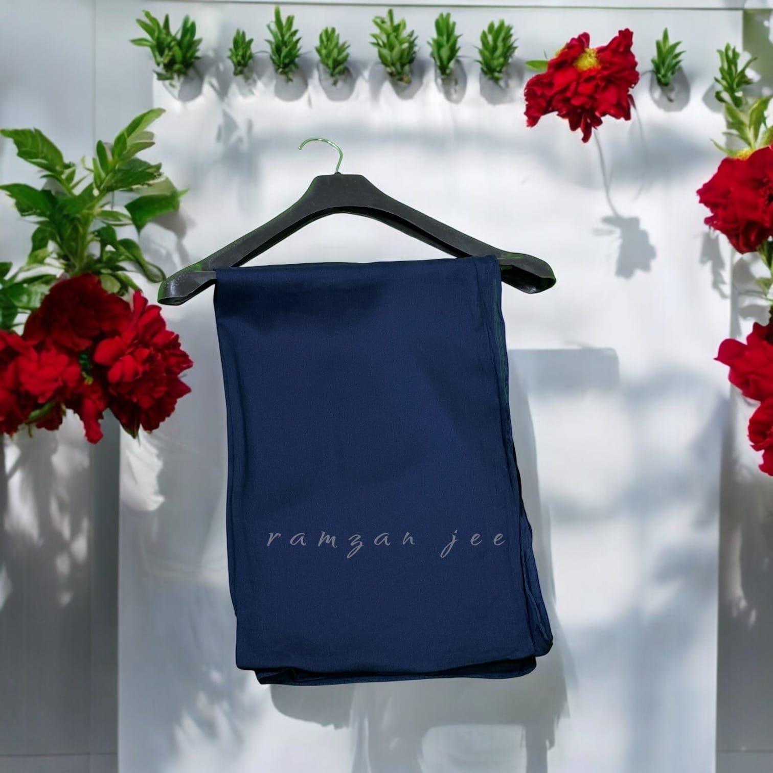 "Lightweight and breathable silk hijab in classic black for full coverage."