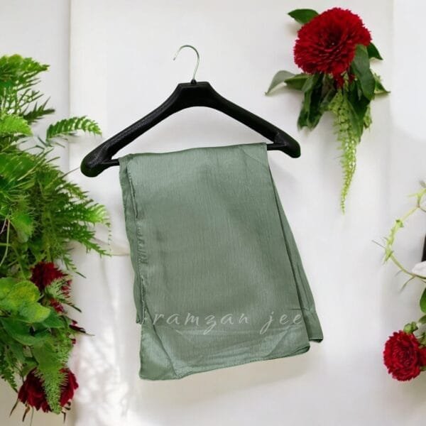 "Versatile silk hijab styled for casual and formal occasions."