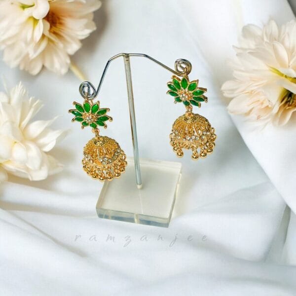 "Elegant earrings with intricate designs, perfect for formal events and evening wear. Available in statement chandelier and drop styles."