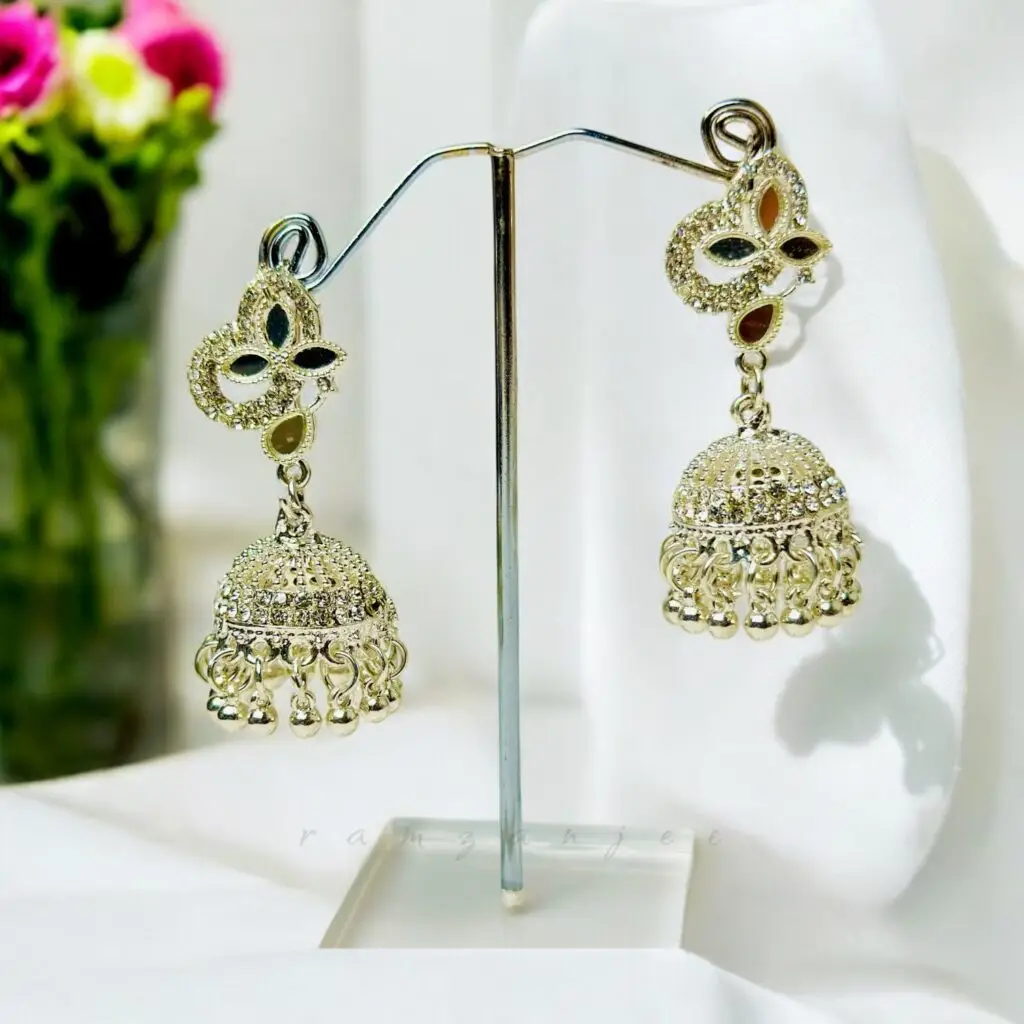 "Elegant earrings with intricate designs, perfect for formal events and evening wear. Available in statement chandelier and drop styles."