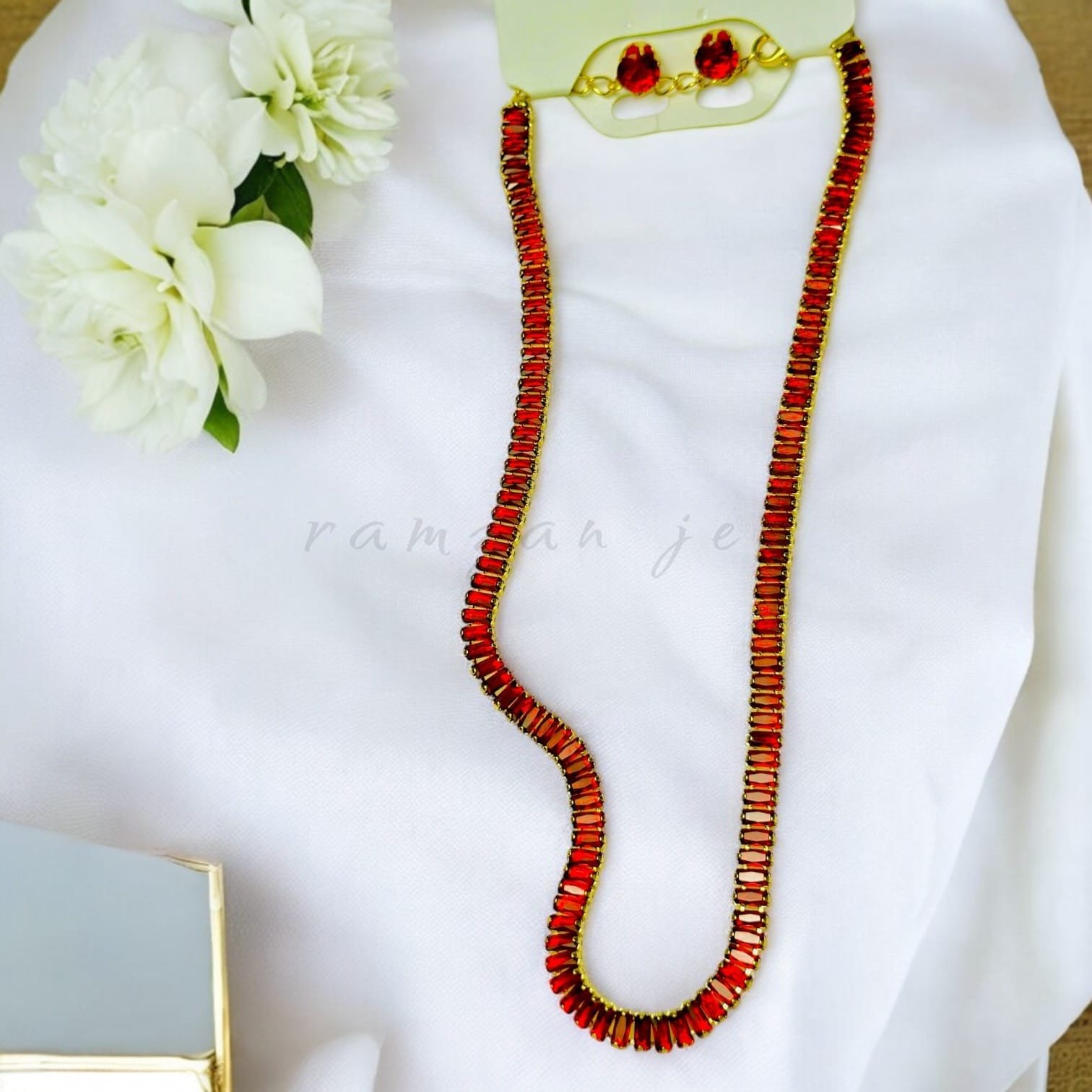 "Handcrafted long mala jewelry with intricate beadwork, perfect for weddings and traditional celebrations"