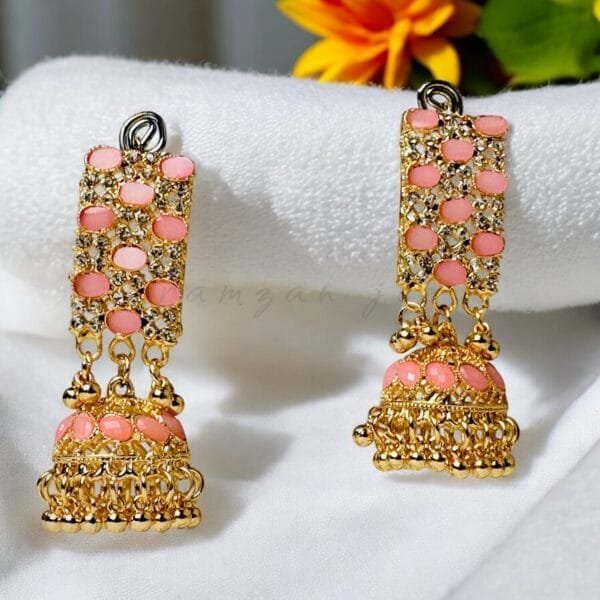 "Elegant earrings with intricate designs, perfect for formal events and evening wear. Available in statement chandelier and drop styles."