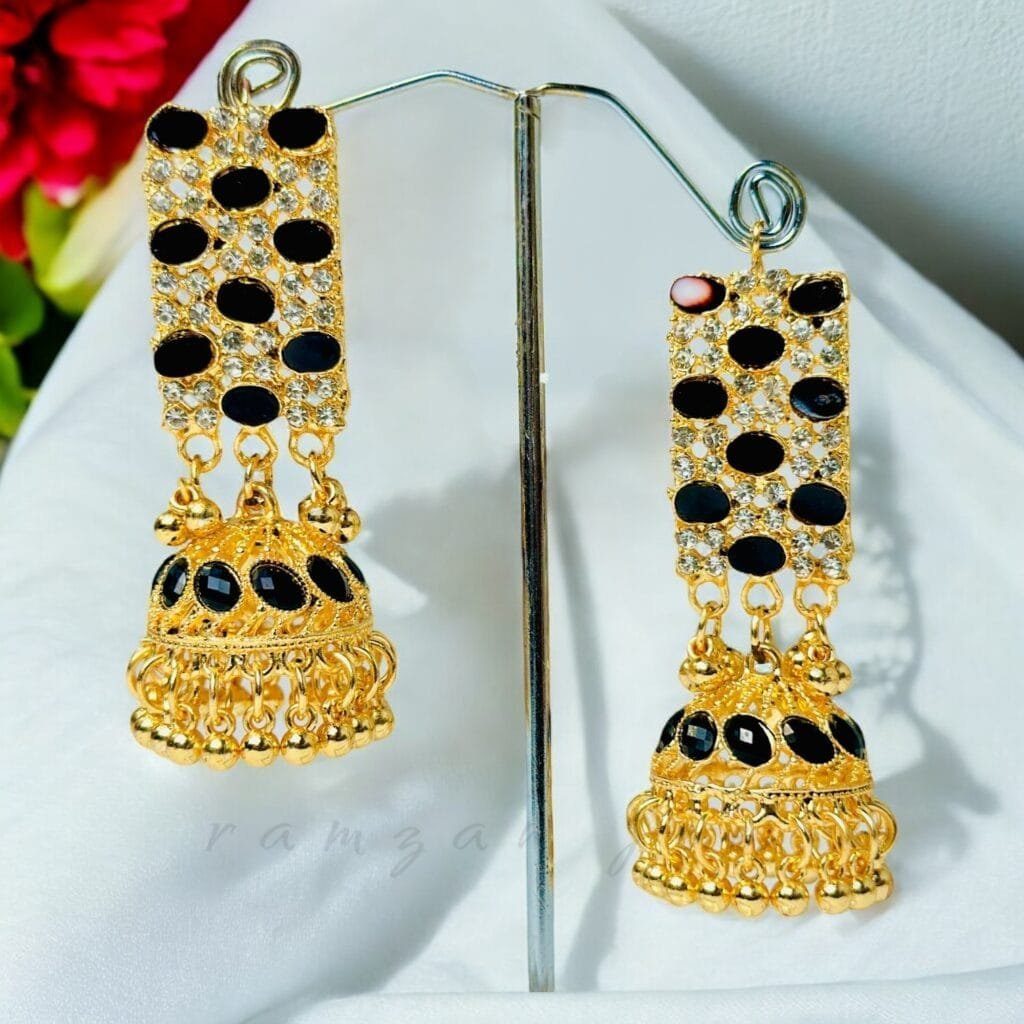 "Elegant earrings with intricate designs, perfect for formal events and evening wear. Available in statement chandelier and drop styles."