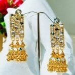 "Elegant earrings with intricate designs, perfect for formal events and evening wear. Available in statement chandelier and drop styles."