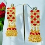 "Elegant earrings with intricate designs, perfect for formal events and evening wear. Available in statement chandelier and drop styles."