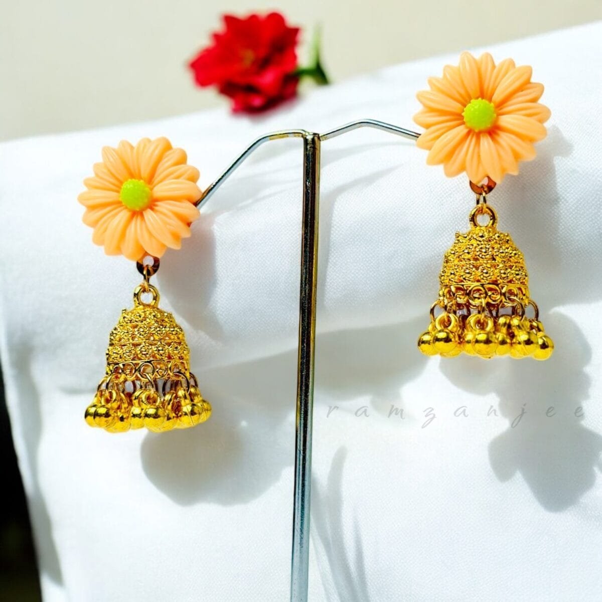 "Elegant earrings with intricate designs, perfect for formal events and evening wear. Available in statement chandelier and drop styles."
