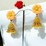 "Elegant earrings with intricate designs, perfect for formal events and evening wear. Available in statement chandelier and drop styles."