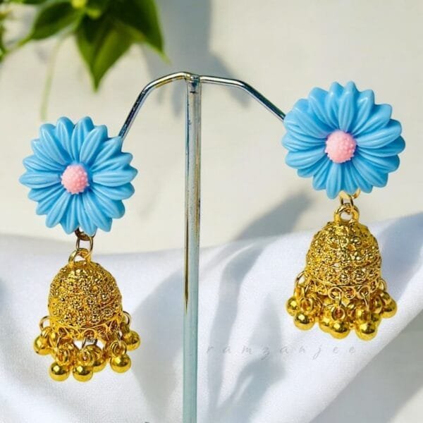 "Elegant earrings with intricate designs, perfect for formal events and evening wear. Available in statement chandelier and drop styles."