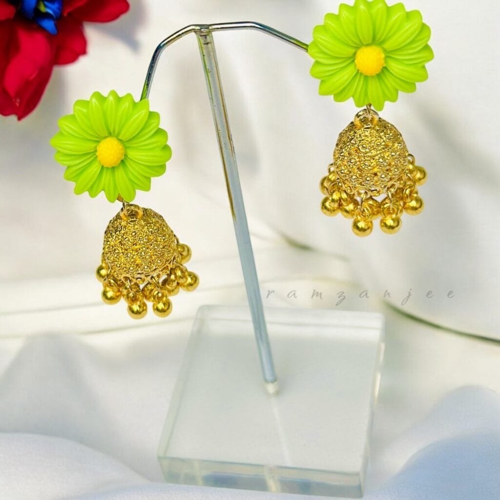 "Elegant earrings with intricate designs, perfect for formal events and evening wear. Available in statement chandelier and drop styles."