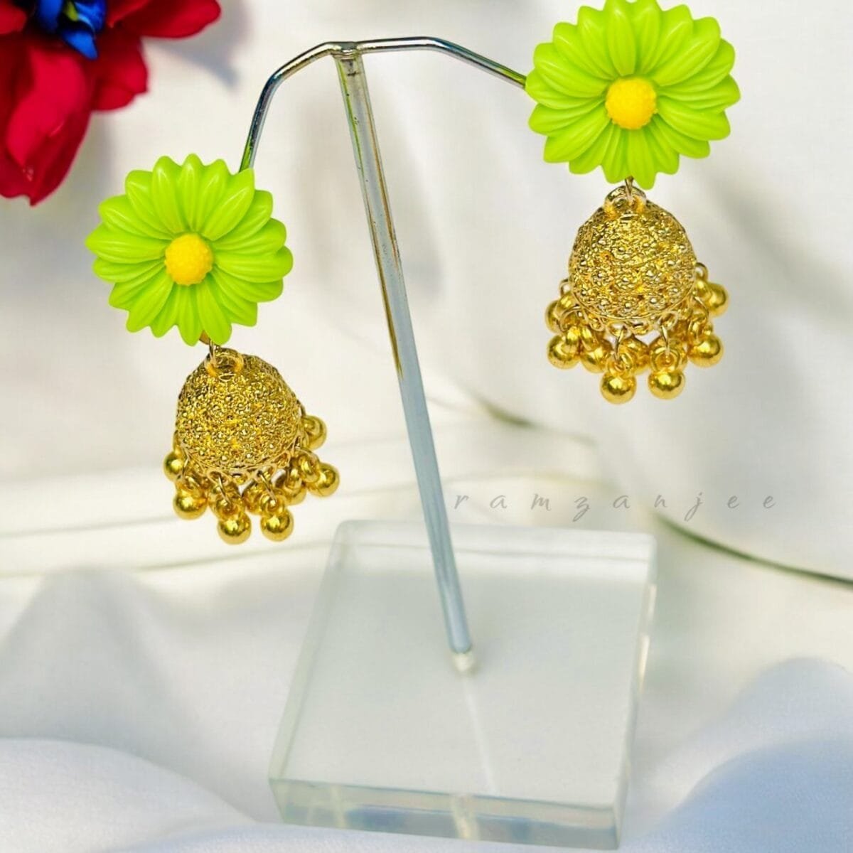"Elegant earrings with intricate designs, perfect for formal events and evening wear. Available in statement chandelier and drop styles."