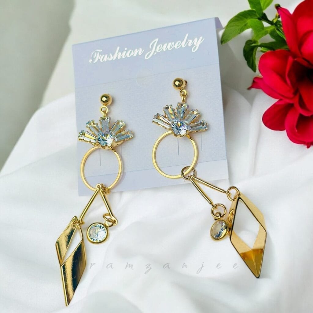 "Elegant earrings with intricate designs, perfect for formal events and evening wear. Available in statement chandelier and drop styles."