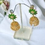 "Elegant earrings with intricate designs, perfect for formal events and evening wear. Available in statement chandelier and drop styles."