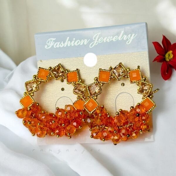"Elegant earrings with intricate designs, perfect for formal events and evening wear. Available in statement chandelier and drop styles."