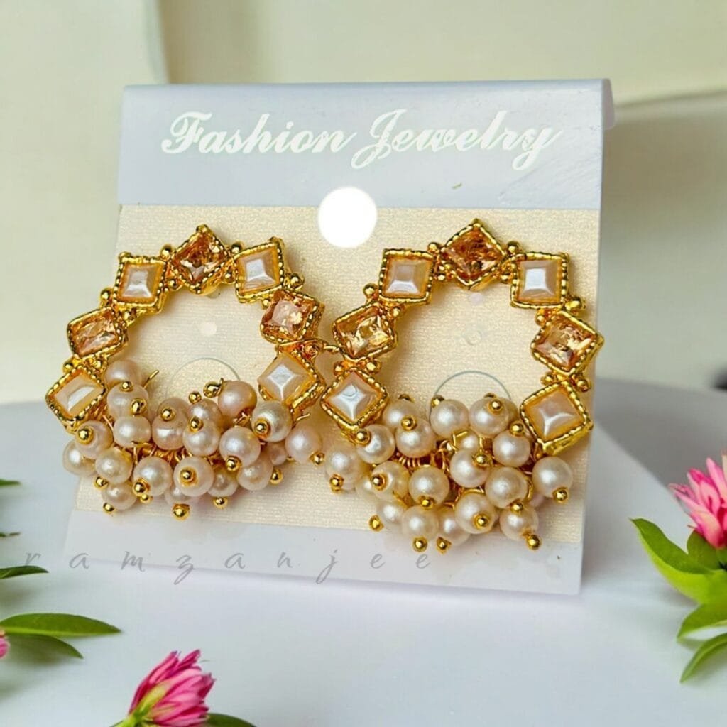 "Elegant earrings with intricate designs, perfect for formal events and evening wear. Available in statement chandelier and drop styles."