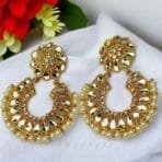 "Elegant earrings with intricate designs, perfect for formal events and evening wear. Available in statement chandelier and drop styles."