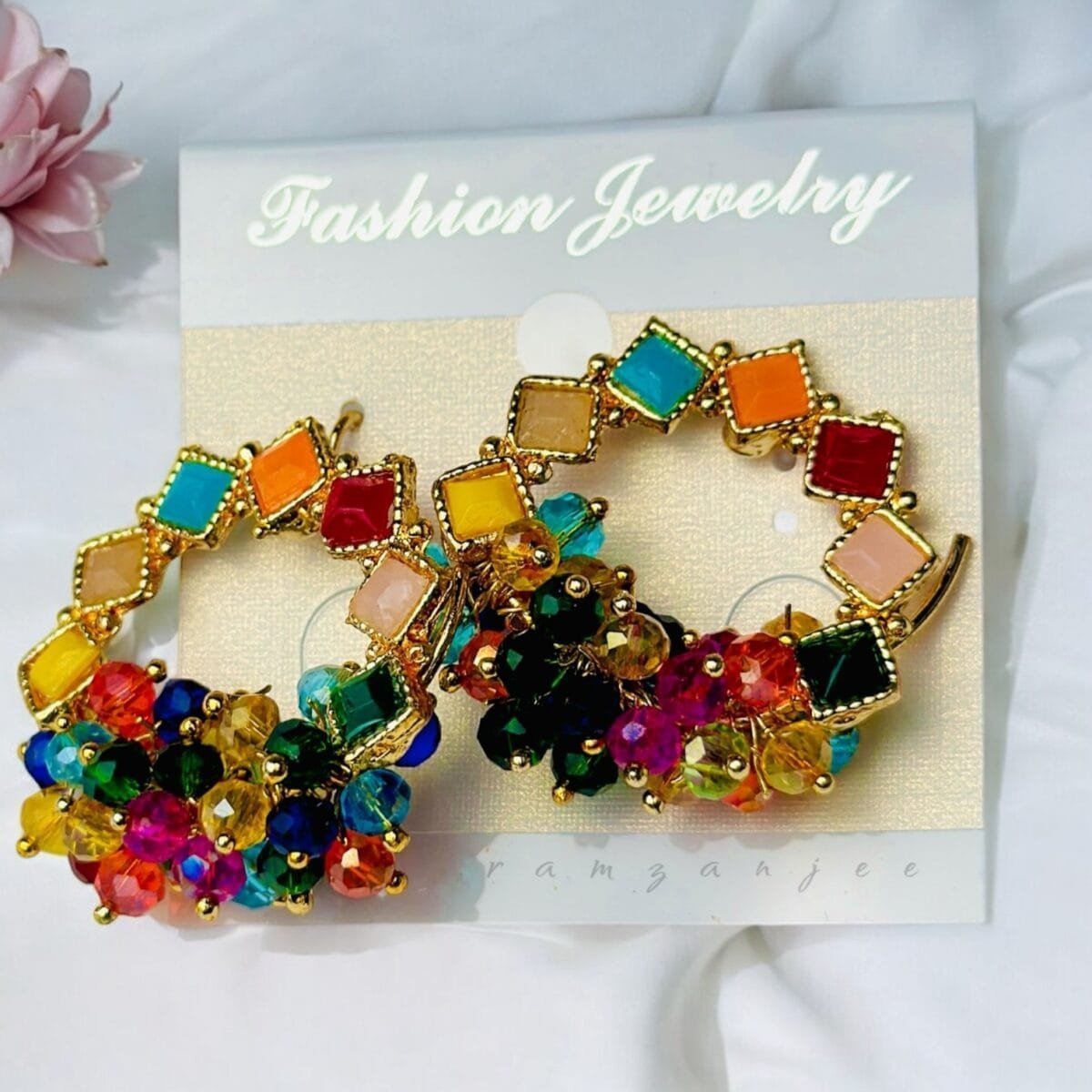 "Elegant earrings with intricate designs, perfect for formal events and evening wear. Available in statement chandelier and drop styles."