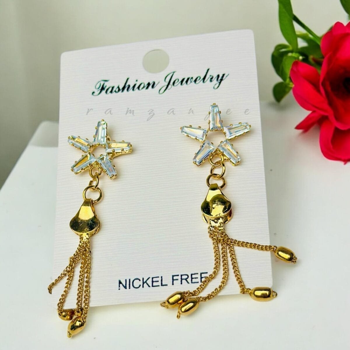 "Elegant earrings with intricate designs, perfect for formal events and evening wear. Available in statement chandelier and drop styles."