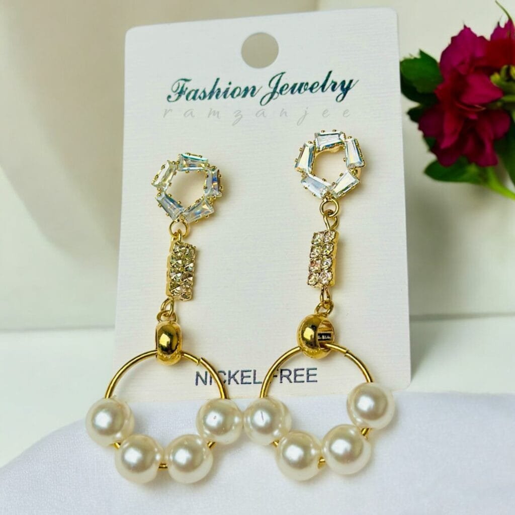 "Elegant earrings with intricate designs, perfect for formal events and evening wear. Available in statement chandelier and drop styles."