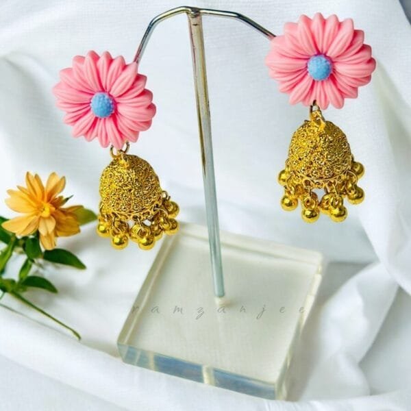 "Elegant earrings with intricate designs, perfect for formal events and evening wear. Available in statement chandelier and drop styles."