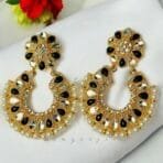 "Elegant earrings with intricate designs, perfect for formal events and evening wear. Available in statement chandelier and drop styles."