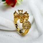 "Elegant diamond engagement ring in a gold band, perfect for weddings."