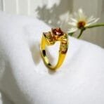 "Elegant diamond engagement ring in a gold band, perfect for weddings."