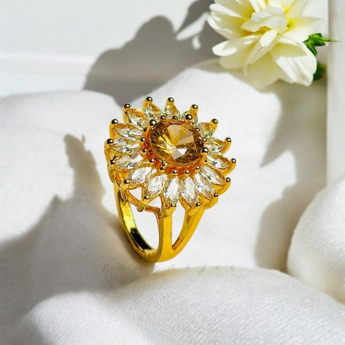 "Elegant diamond engagement ring in a gold band, perfect for weddings."